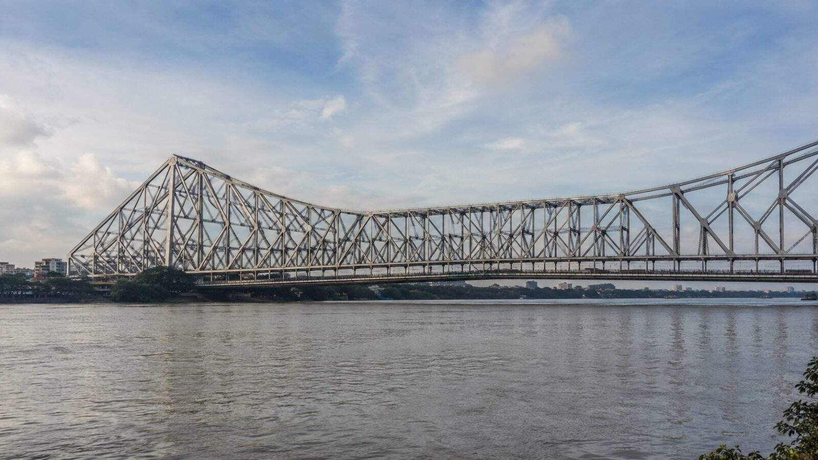 Howrah Bridge over the Hooghly River in Kolkata in clear daylight