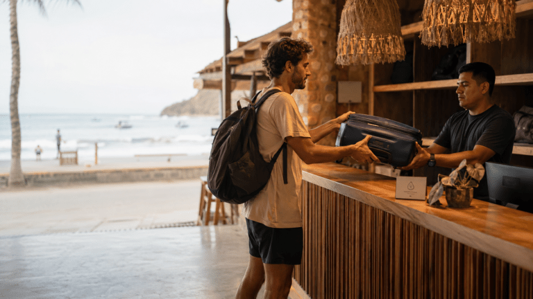 Traveler using luggage storage in Mancora near surf beaches and town streets
