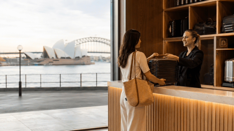 Traveler using luggage storage in Sydney before exploring the harbour and city centre